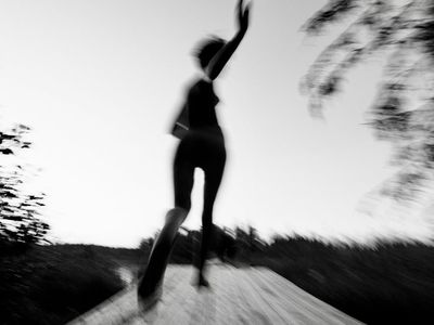 Abstract motion blur of a person exercising.