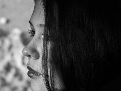 Close up of a water bottle and a towel.